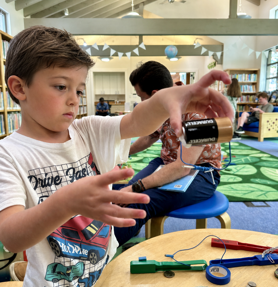Testing the magnetic rover on its course.