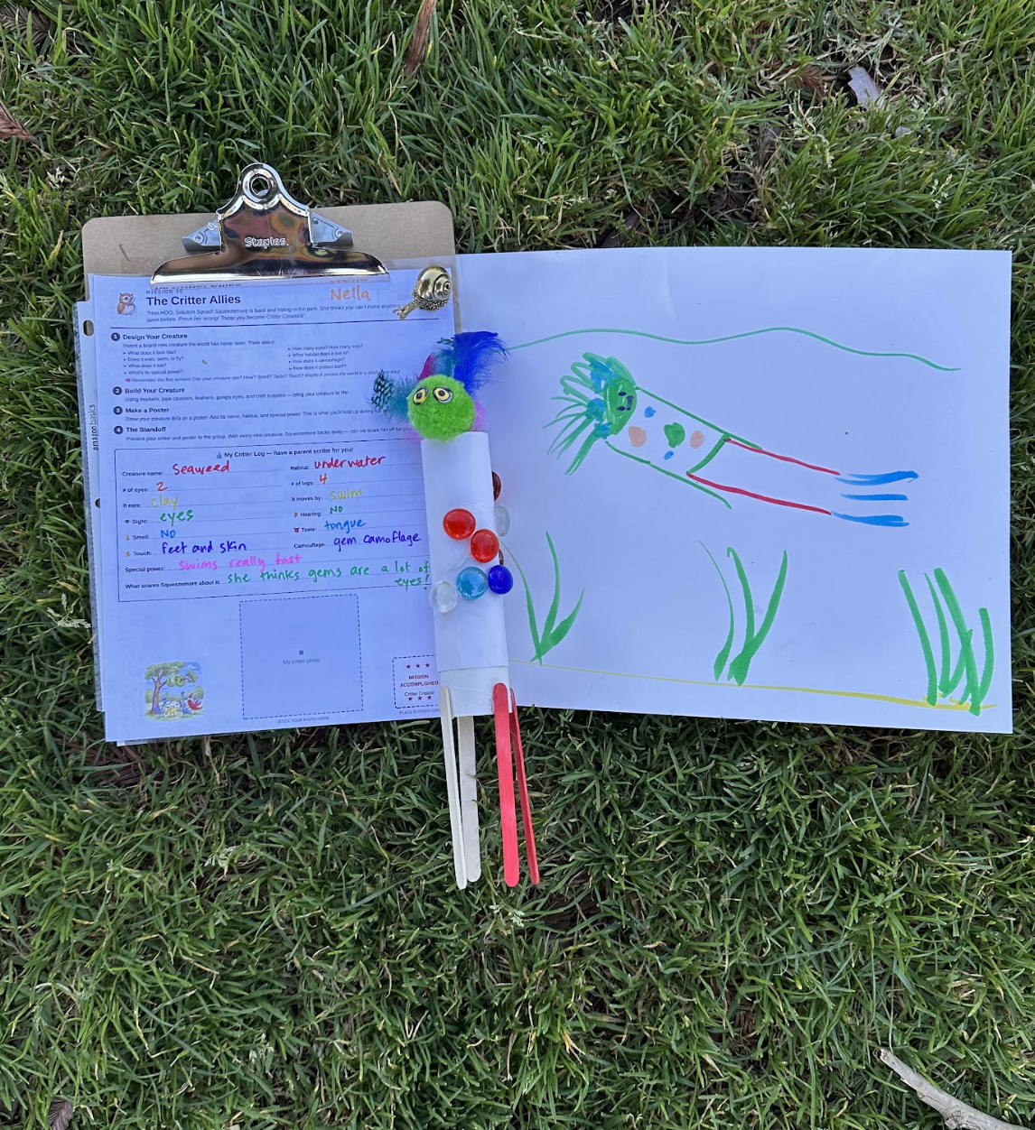 An invented critter alongside its drawing.